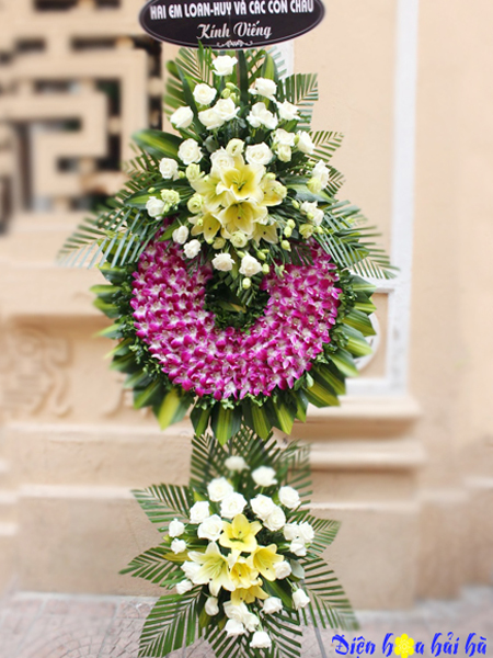Đặt vòng hoa chia buồn tại nhà tang lễ bv 198 lan tím, hồng trắng, giá 1,000,000 vnd