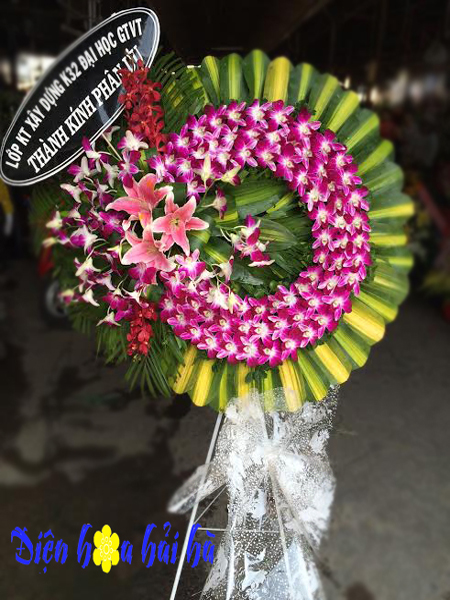 Đặt vòng hoa phúng điếu tại nhà tang lễ 198 Trần Bình, hoa lan tím, giá 800,000 vnd.