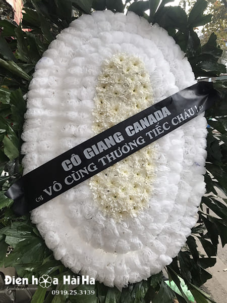 Mã: HV-020VN - Vòng hoa mầu trắng tại Hà Nội. Vòng hoa viếng người mất trẻ tuổi tại Miền Bắc.